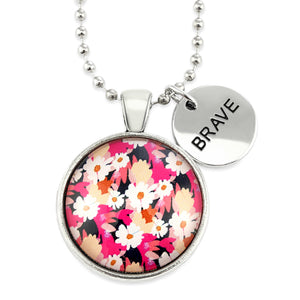 Circle pendant necklace in vintage silver with 'BRAVE' charm, bright pink floral print. Fundraiser for the national breast cancer foundation.