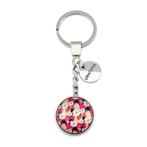 Circle pendant keychain in vintage silver with 'grateful' charm, bright pink floral print. Fundraiser for the national breast cancer foundation.