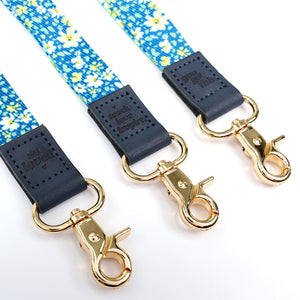 blue floral teacher lanyard with gold clip. Choose from so loved, teach love inspire or you got this. 