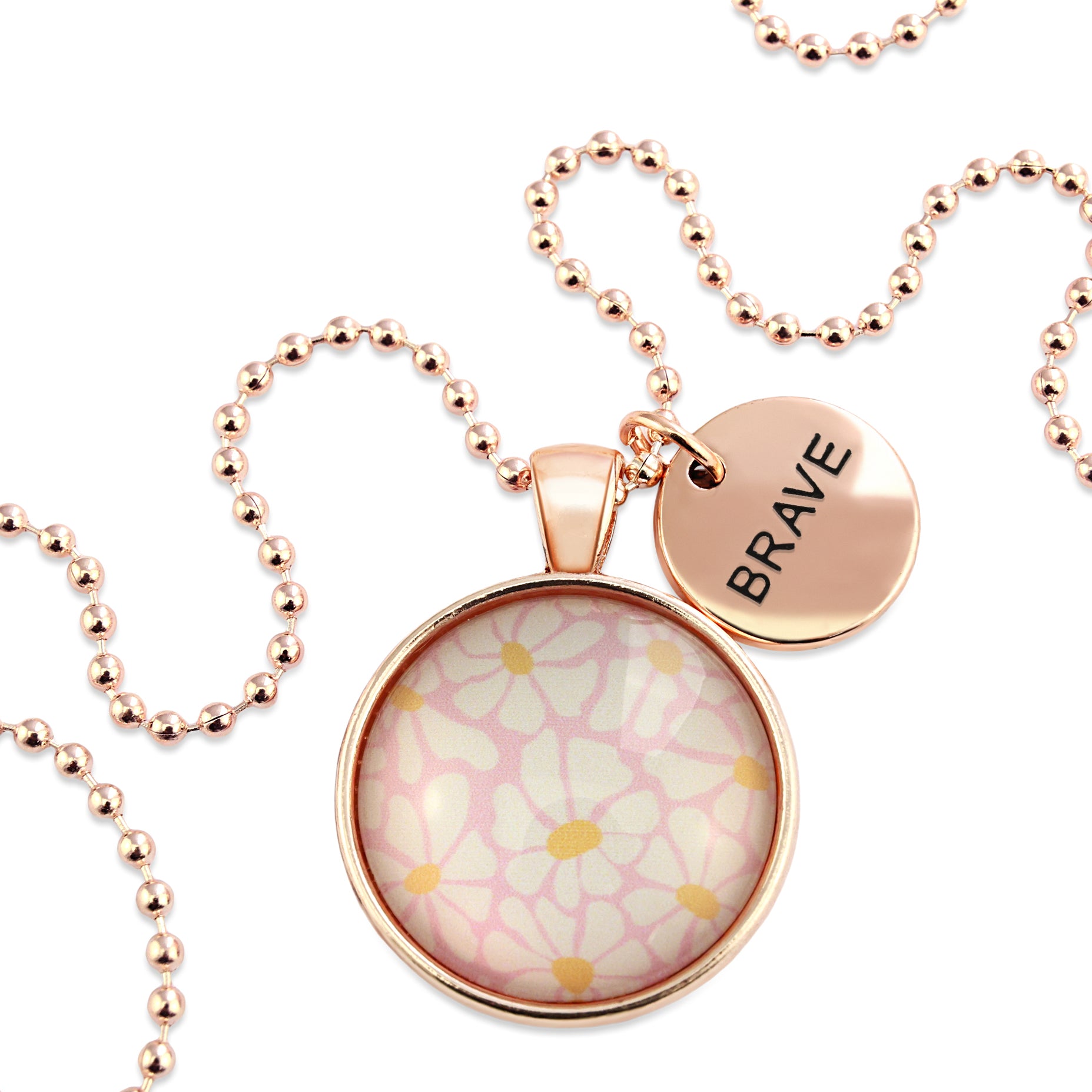 Circle pendant necklace in rose gold with 'brave' charm, floral print. Fundraiser for the national breast cancer foundation.