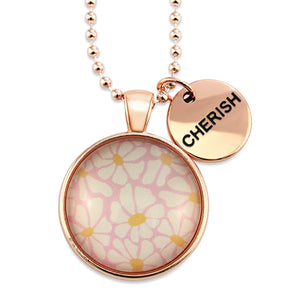 Circle pendant necklace in rose gold with 'cherish' charm, floral print. Fundraiser for the national breast cancer foundation.