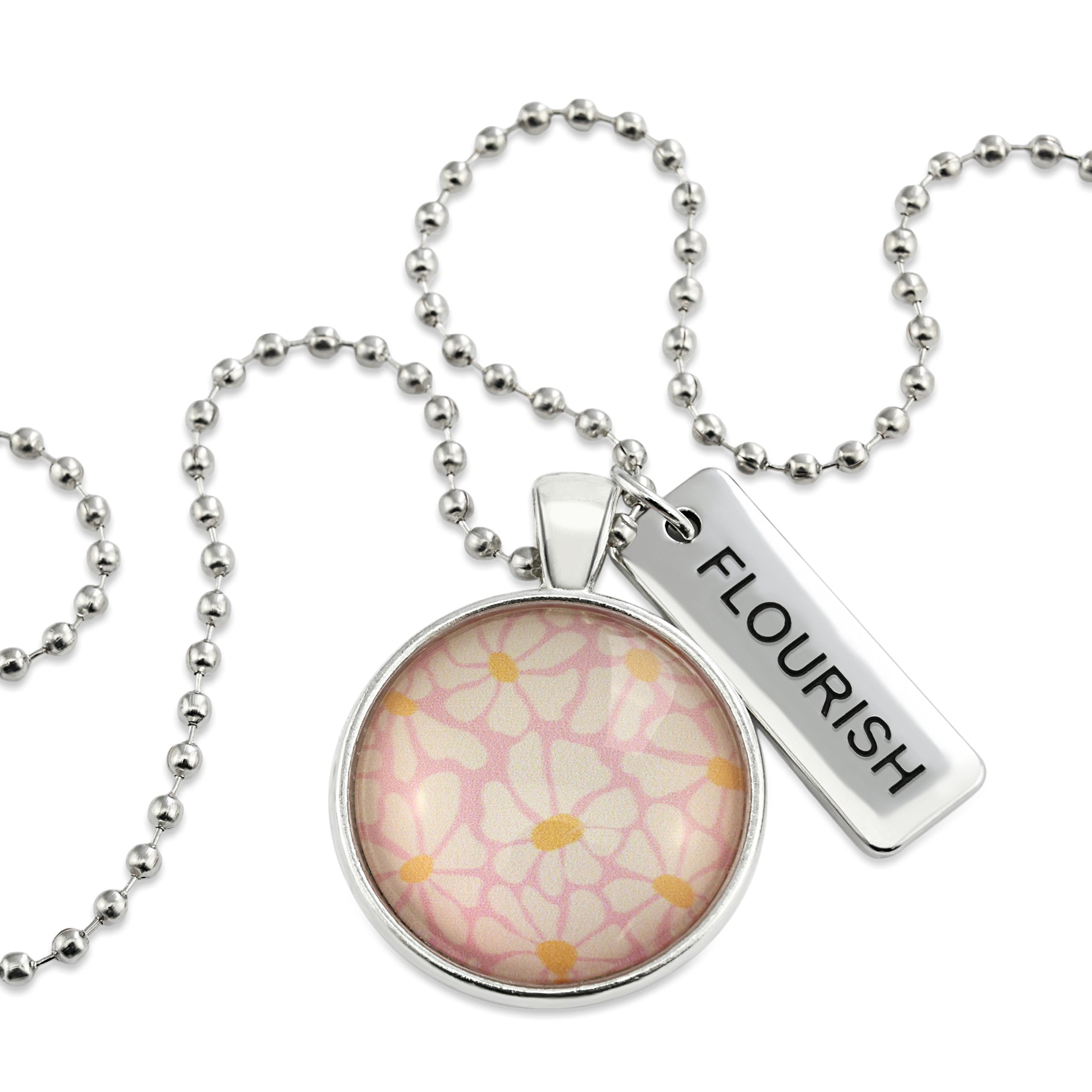 Circle pendant necklace in silver with 'flourish' charm, floral print. Fundraiser for the national breast cancer foundation.