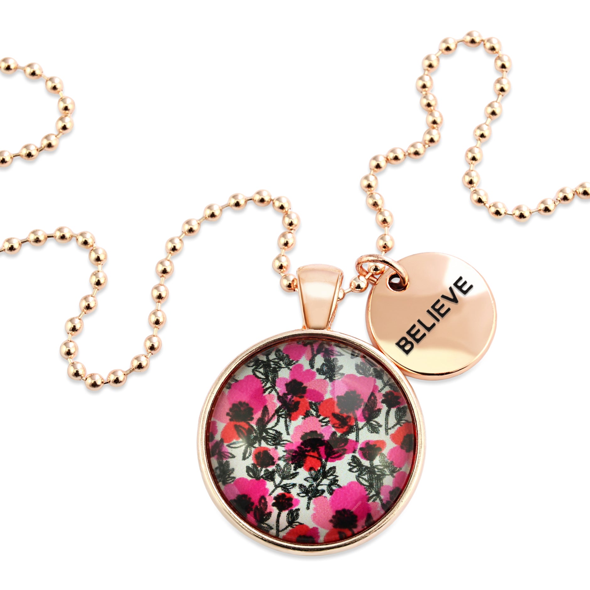 Pink print rose gold circle pendant necklace with ball chain and 'Believe' charm. This product is raising money for the National Breast Cancer Foundation. 