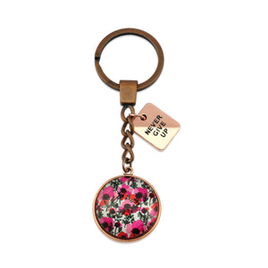 Pink print vintage copper red keychain circle pendant 'Never Give Up' charm. This product is raising money for the National Breast Cancer Foundation. 