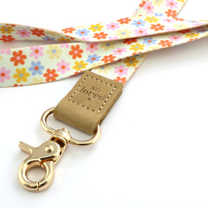 cream floral teacher lanyard with gold clip. Choose from so loved, teach love inspire or you got this. 