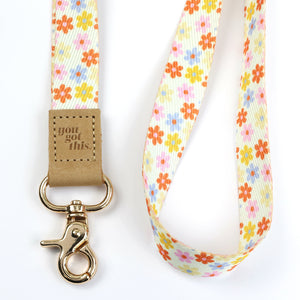 cream floral teacher lanyard with gold clip. Choose from so loved, teach love inspire or you got this. 