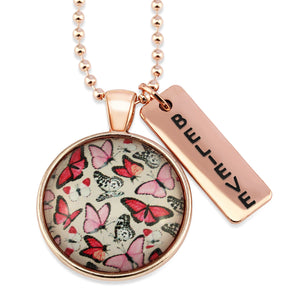 Pink floral print circle pendant rose gold necklace with ball chain with 'believe' word charm. Fundraising product for the National Breast Cancer Foundation. 