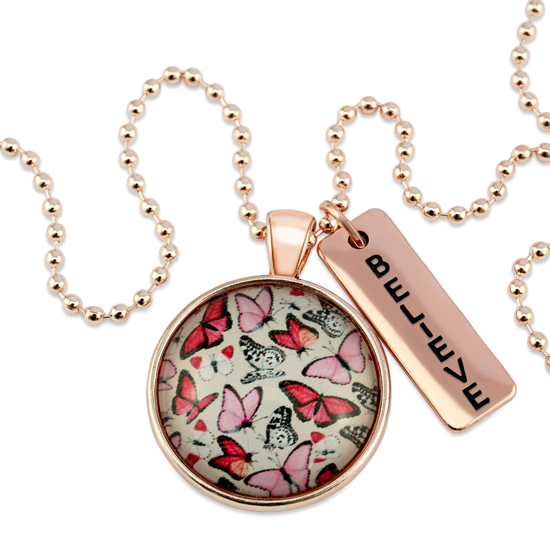 Pink floral print circle pendant rose gold necklace with ball chain with 'believe' word charm. Fundraising product for the National Breast Cancer Foundation. 