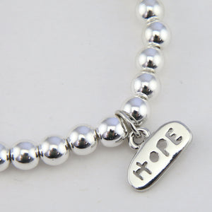 Christmas Bracelet  - Silver Hematite 6mm Bead Bracelet with Silver Word Charm