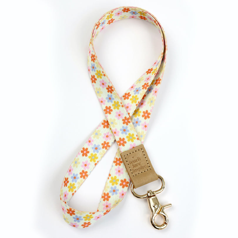 cream floral teacher lanyard with gold clip. Choose from so loved, teach love inspire or you got this. 