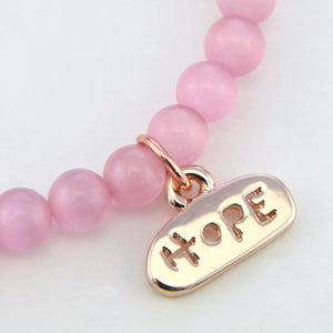 Christmas Bracelet  - Soft Pink Cats Eye 6mm Bead Bracelet with Rose Gold Word Charm