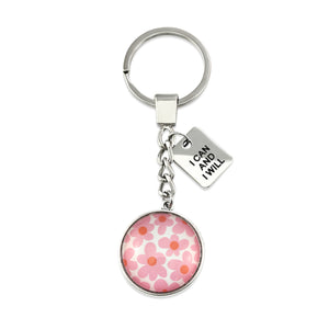 Pink floral print vintage silver circle pendant keychain with 'I Can And I Will' charm. A product that fundraises for the National Breast Cancer Foundation. 