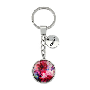 Pink floral print silver circle pendant keychain with 'family' charm. A product that fundraises for the National Breast Cancer Foundation. 