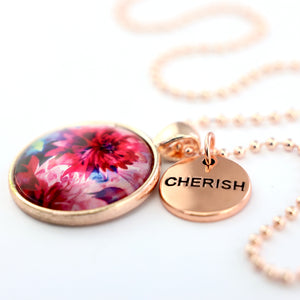 Pink floral print rose gold circle pendant necklace with 'cherish' charm. A product that fundraises for the National Breast Cancer Foundation. 