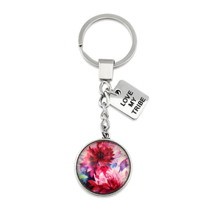 Pink floral print silver circle pendant keychain with 'family' charm. A product that fundraises for the National Breast Cancer Foundation. 