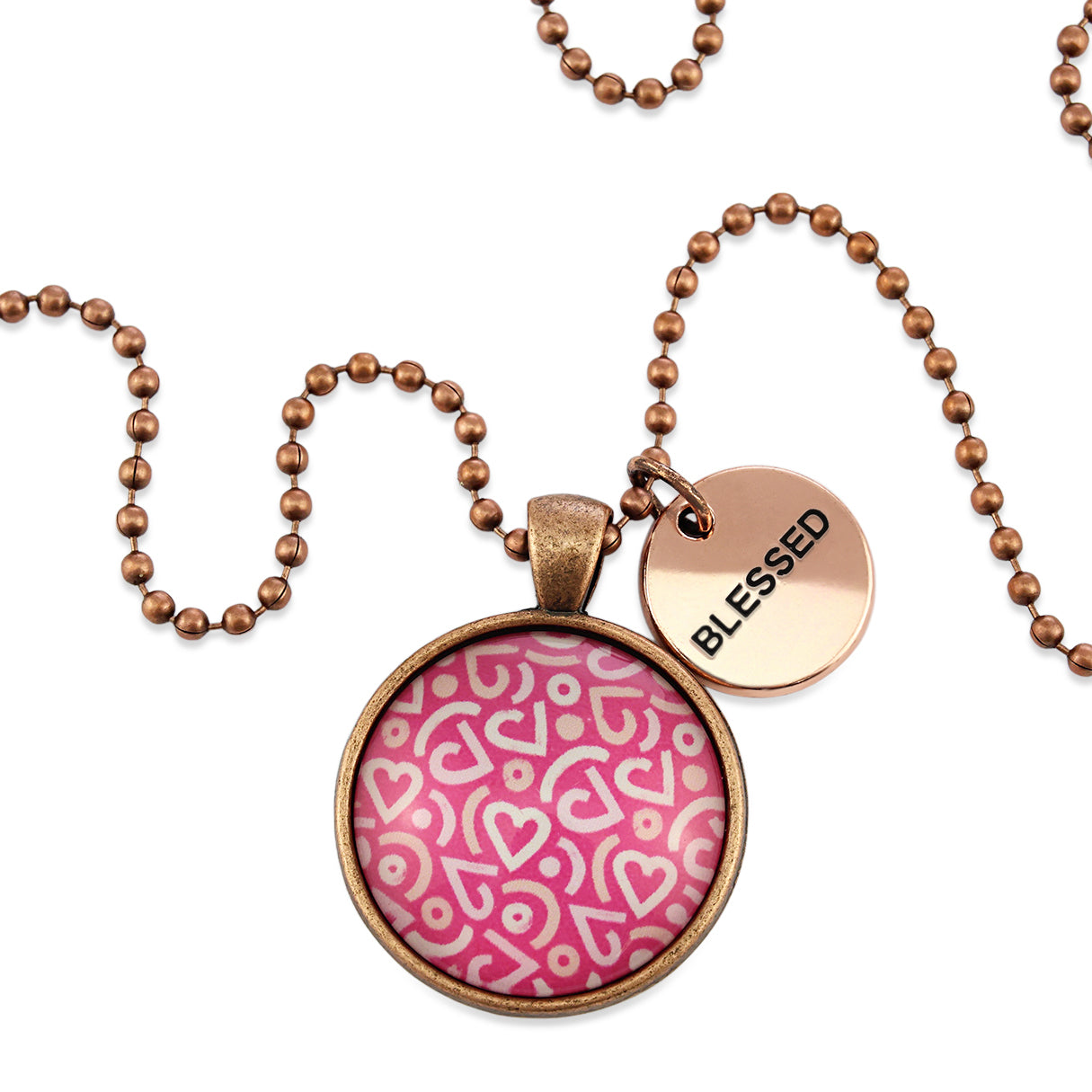 Pink heart print vintage red copper circle pendant necklace with 'blessed' charm. A fundraising product for the national breast cancer foundation. 