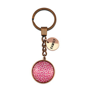 Pink floral print vintage copper circle pendant keychain with 'Family' charm. A product that fundraises for the National Breast Cancer Foundation. 