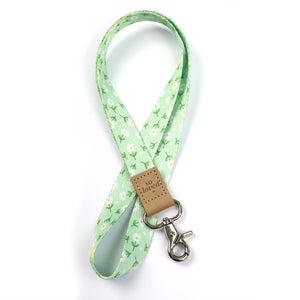 Mint green floral teacher lanyard with gold clip. Choose from so loved, teach love inspire or you got this. 