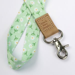 Mint green floral teacher lanyard with gold clip. Choose from so loved, teach love inspire or you got this. 