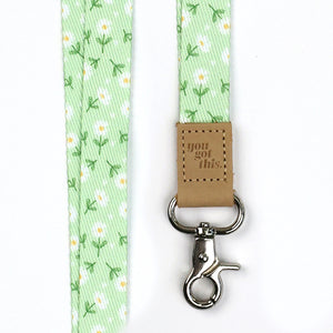 Mint green floral teacher lanyard with gold clip. Choose from so loved, teach love inspire or you got this. 