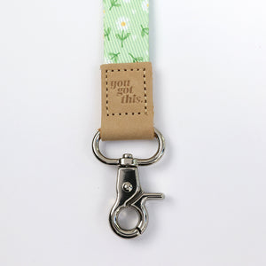 Mint green floral teacher lanyard with gold clip. Choose from so loved, teach love inspire or you got this. 