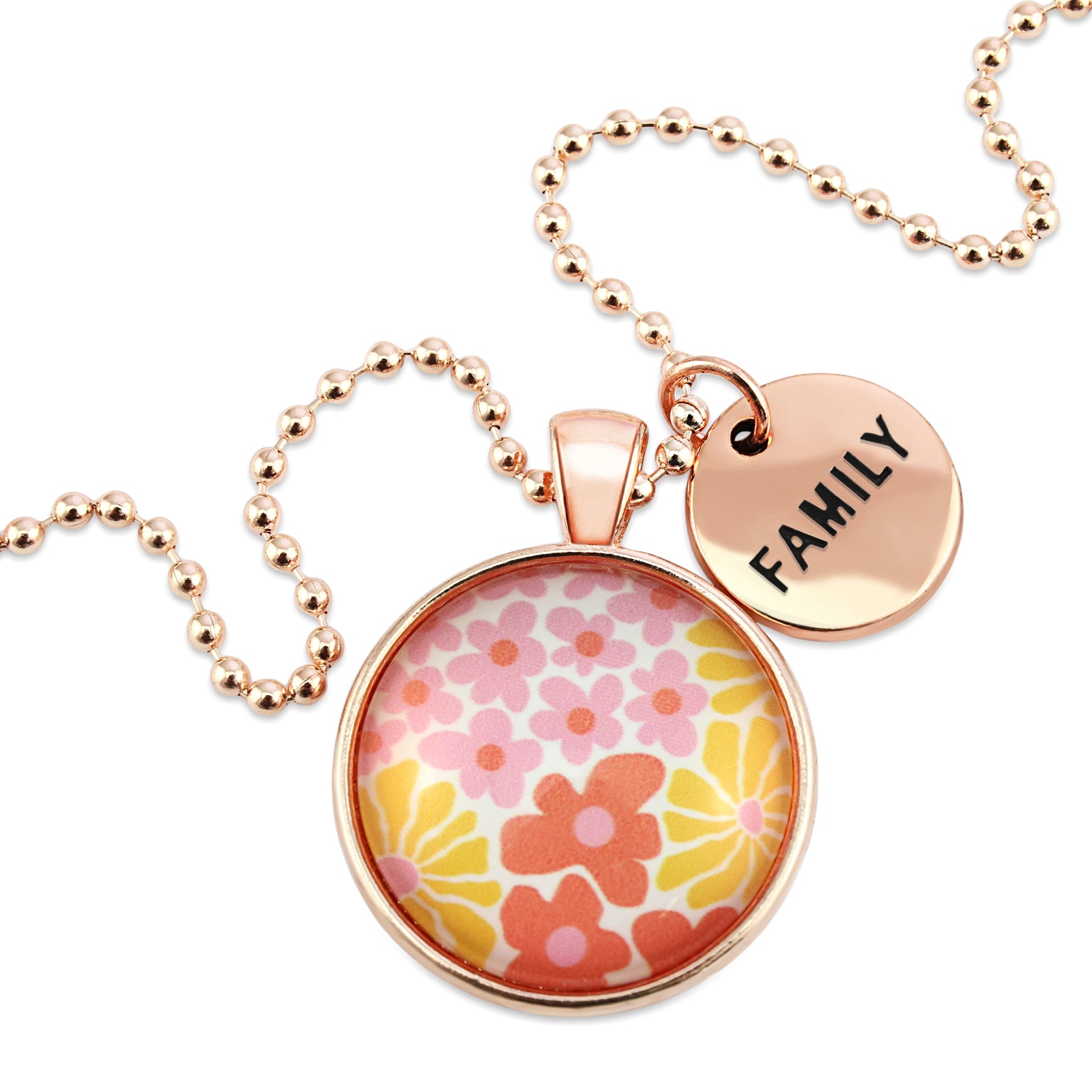 Pink floral print circle pendant silver ball chain necklace with rose gold 'family' word charm. Fundraising product for the National Breast Cancer Foundation. 