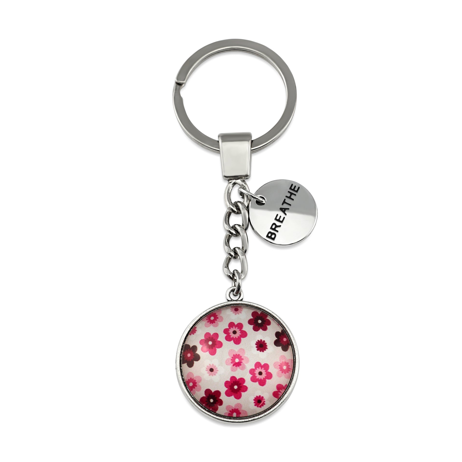 Pink floral print circle keychain pendant silver 'warrior' word charm. Fundraising product for the National Breast Cancer Foundation. 