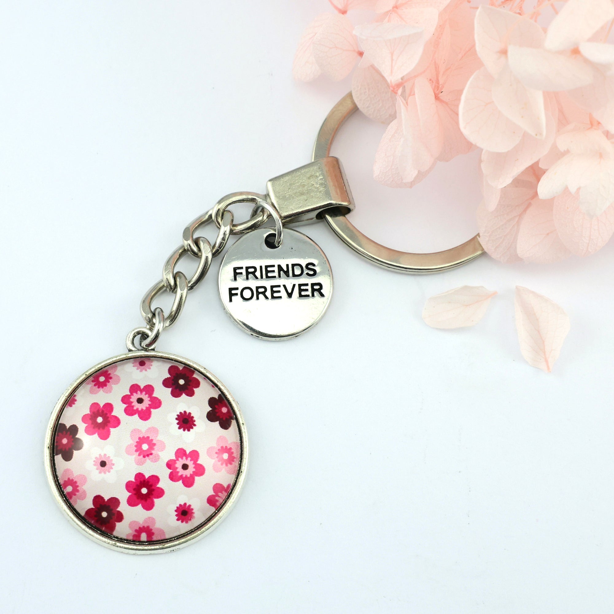 Pink floral print circle keychain pendant silver 'friends forever' word charm. Fundraising product for the National Breast Cancer Foundation. 