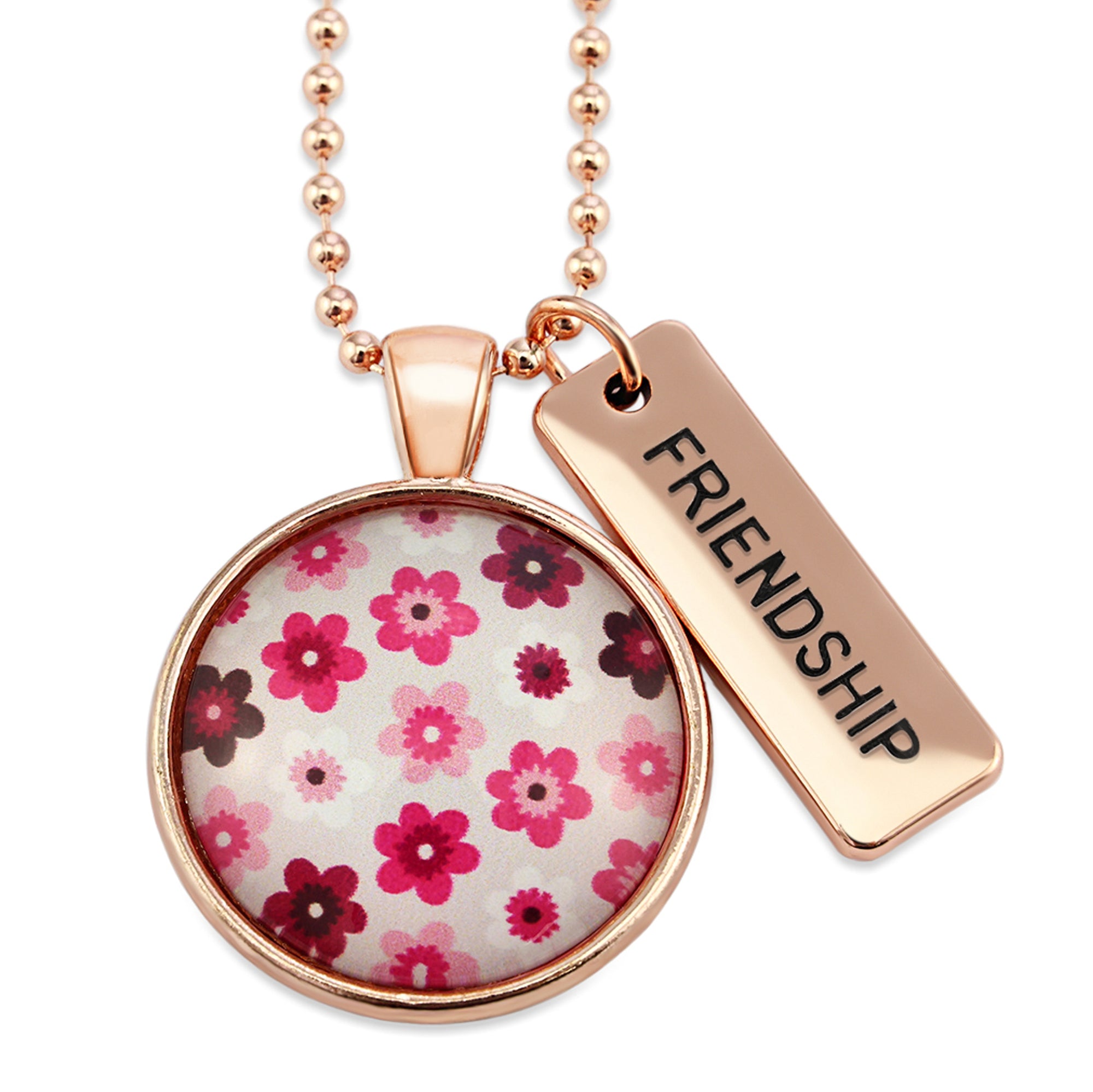 Pink floral print circle pendant rose gold ball chain necklace with rose gold 'friendship' word charm. Fundraising product for the National Breast Cancer Foundation. 