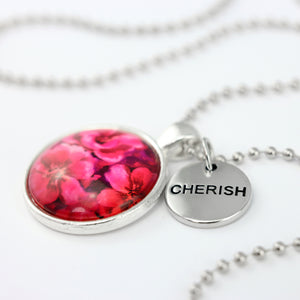 Circle pendant necklace in silver with cherish charm, floral print, ball chain necklace. Fundraiser for the national breast cancer foundation.