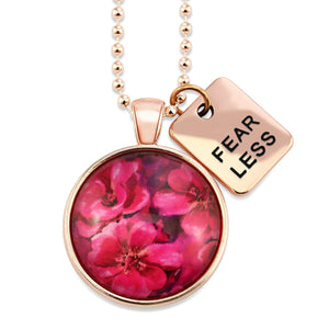 Circle pendant necklace in rose gold with 'fearless' charm, floral print, ball chain necklace. Fundraiser for the national breast cancer foundation.