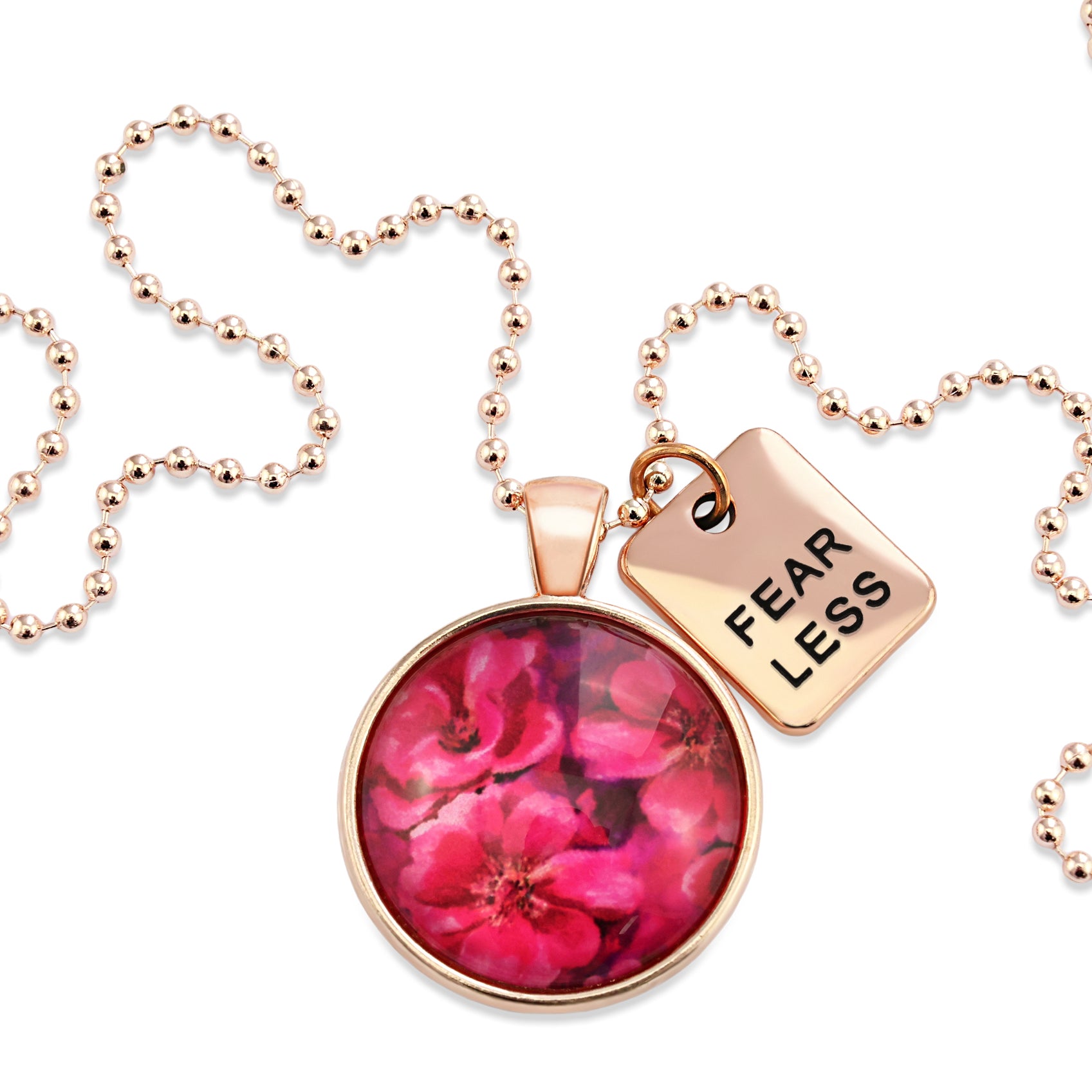 Circle pendant necklace in rose gold with 'fearless' charm, floral print, ball chain necklace. Fundraiser for the national breast cancer foundation.