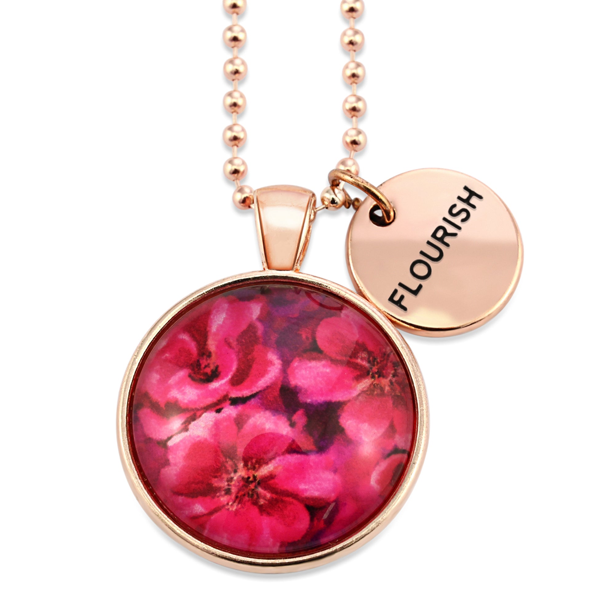 Circle pendant necklace in rose gold with 'flourish' charm, floral print, ball chain necklace. Fundraiser for the national breast cancer foundation.