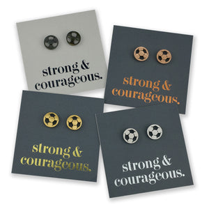 Stainless steel hypoallergenic soccer foorball stud earring, presented on a foil card that says strong and courageous. 