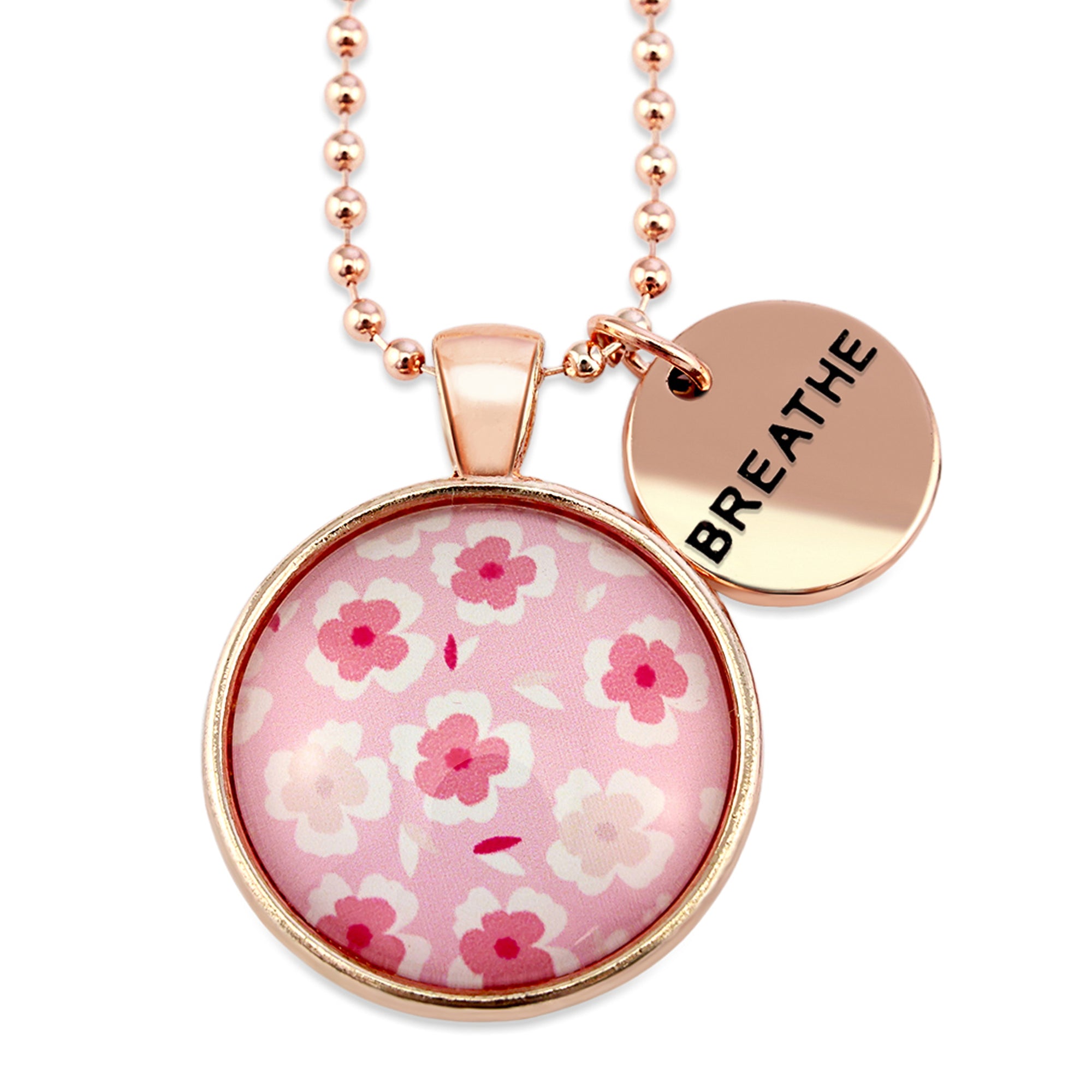 Pink floral print circle pendant rose gold ball chain necklace with rose gold 'soul sister' word charm. Fundraising product for the National Breast Cancer Foundation. 