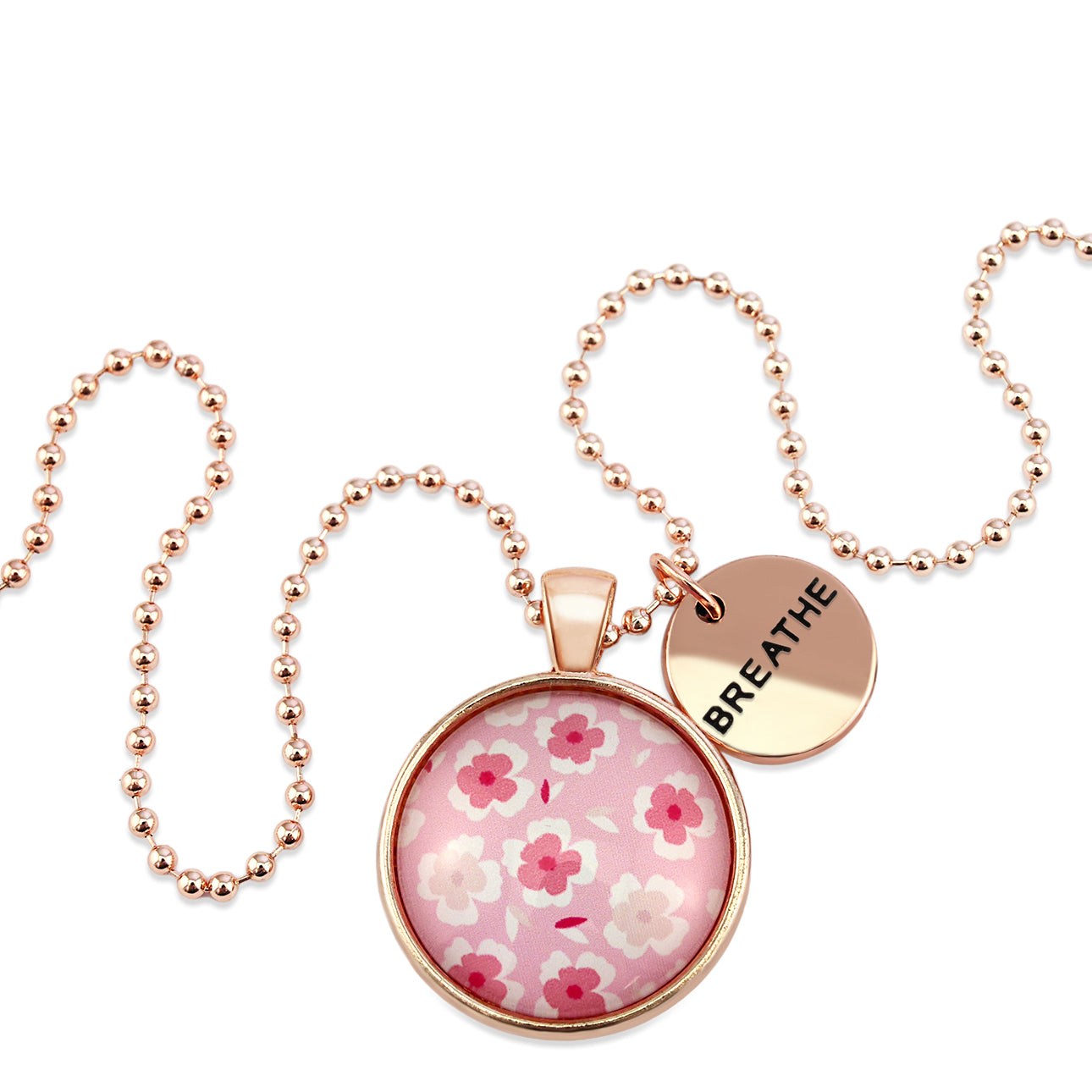 Pink floral print circle pendant rose gold ball chain necklace with rose gold 'soul sister' word charm. Fundraising product for the National Breast Cancer Foundation. 