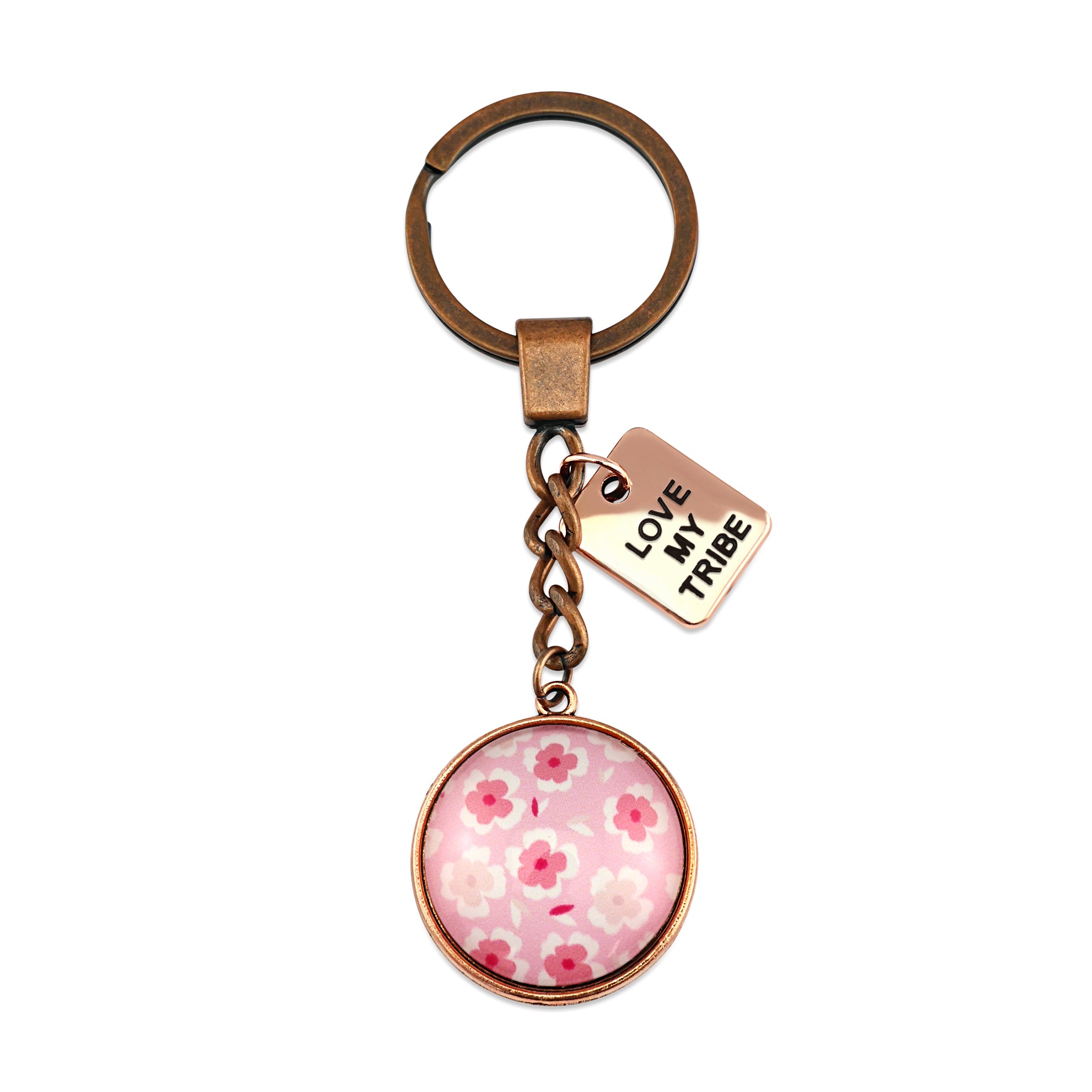 Circle pendant keyring in vintage copper with 'love my tribe ' charm, soft pink floral print. Fundraiser for the national breast cancer foundation.