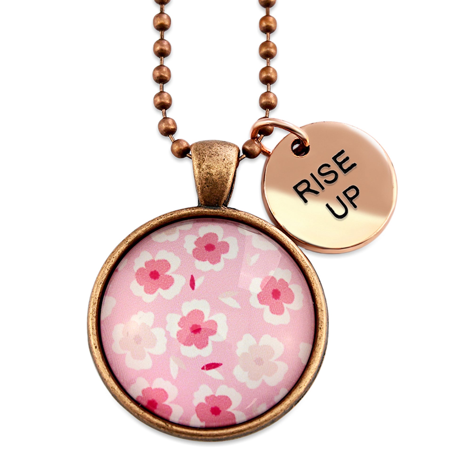 Pink floral print circle pendant vintage red copper ball chain necklace with rose gold 'rise up' word charm. Fundraising product for the National Breast Cancer Foundation. 