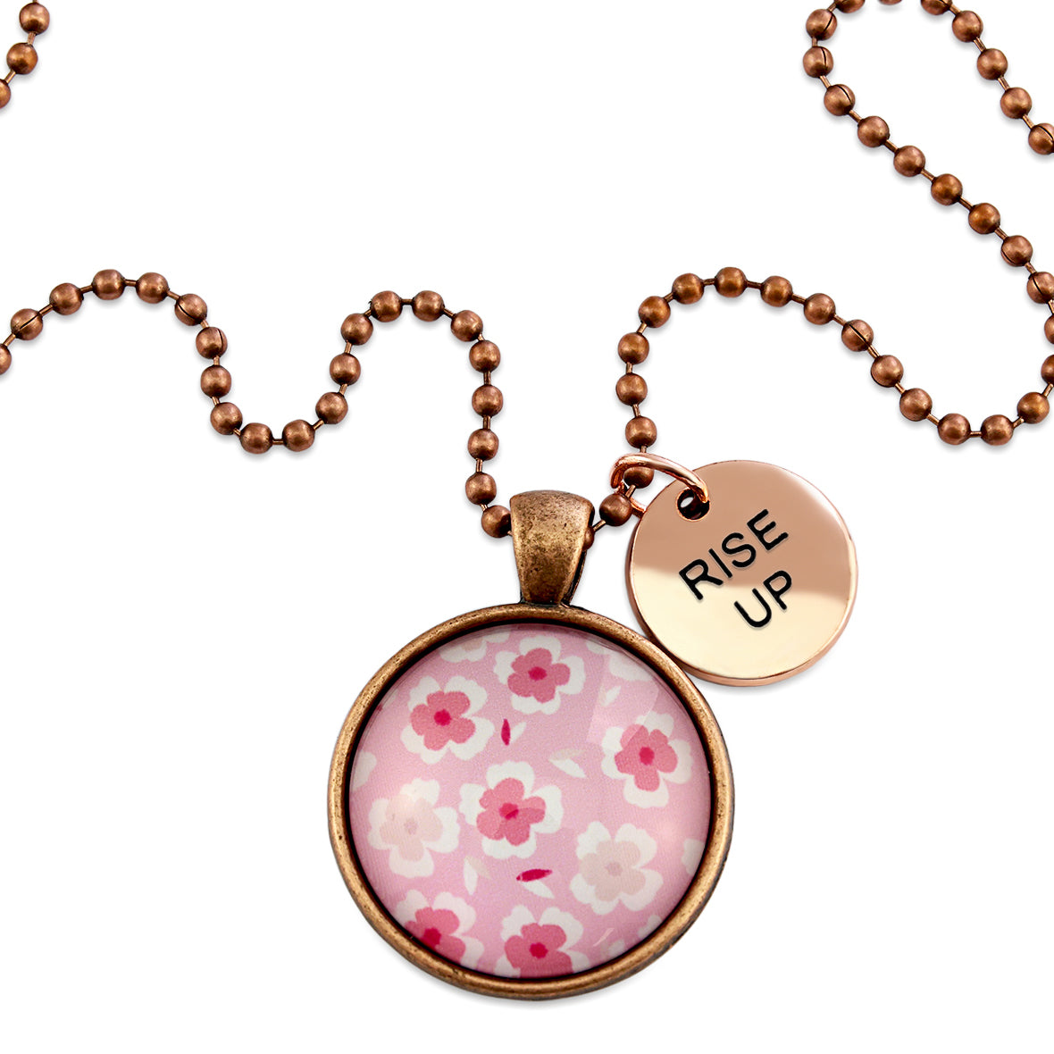 Pink floral print circle pendant vintage red copper ball chain necklace with rose gold 'rise up' word charm. Fundraising product for the National Breast Cancer Foundation. 