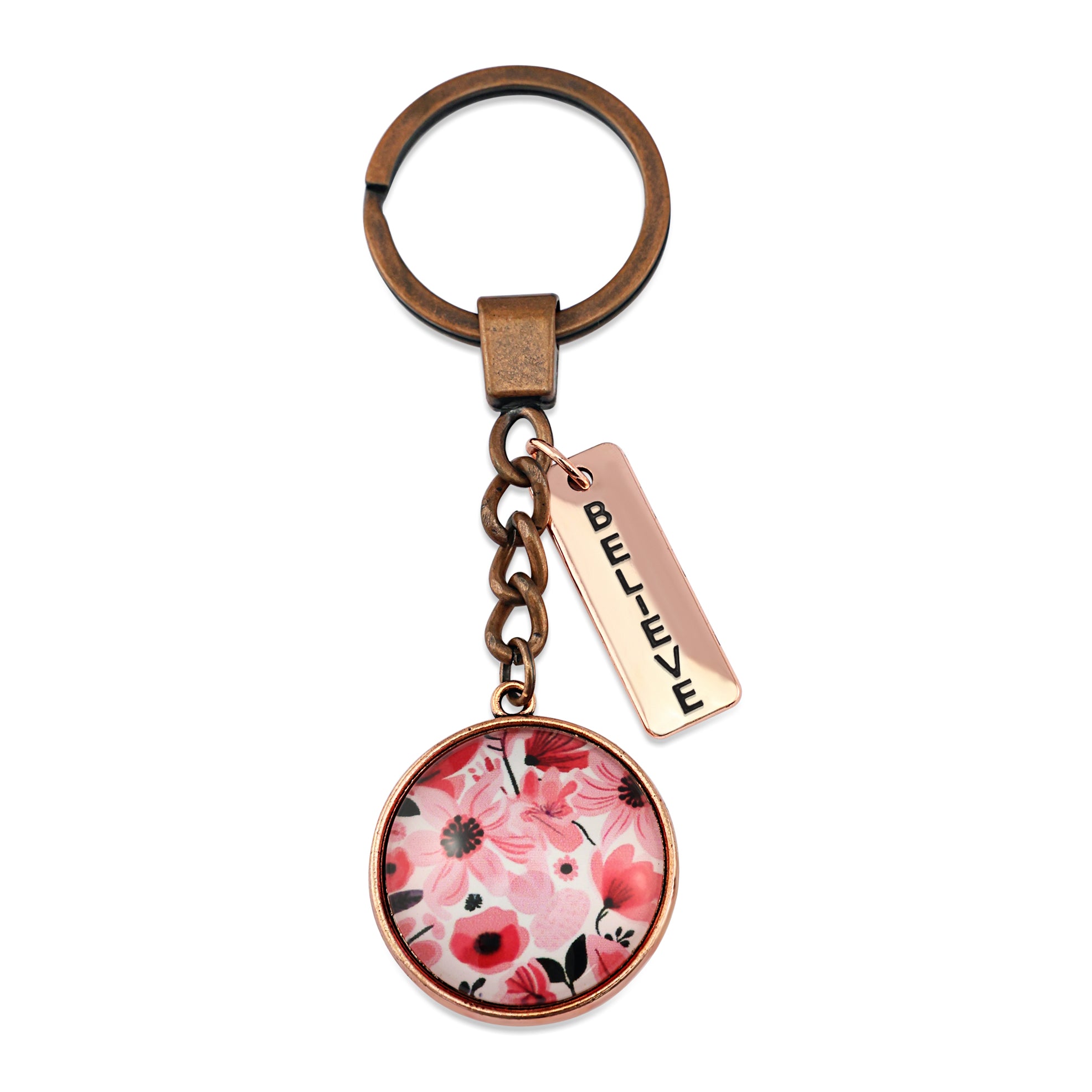 Circle pendant keyring in vintage copper with 'believe ' charm, pop pink floral print. Fundraiser for the national breast cancer foundation.