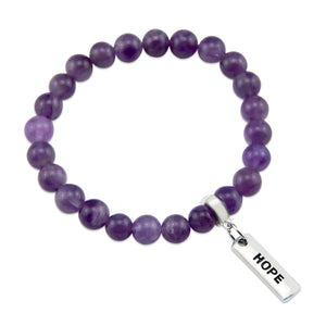 Purple amethyst stone bead bracelet with charm featuring meaningful and inspiring words with silver clip. 