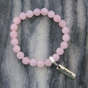 Rose Quartz 8mm stone bracelet with silver brave word charm and clip. 