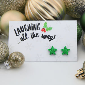 Green glitter star acrylic earring studs with hypoallergenic posts on keep shining posts. 