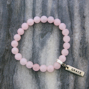 Rose Quartz 8mm stone bracelet with silver grace word charm and clip. 