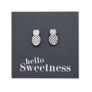 silver hypoallergenic stainless steel pineapple studs on foil hello sweetness