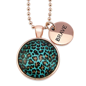 Teal leopard print pendant necklace in rose gold with brave charm. 