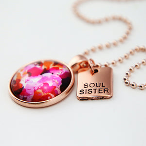 Reds and pinks floral petal print pendant necklace in rose gold with ball chain and SOUL SISTER word charm.