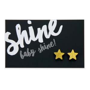 Gold glitter star acrylic earring stud on shine baby shine card. 