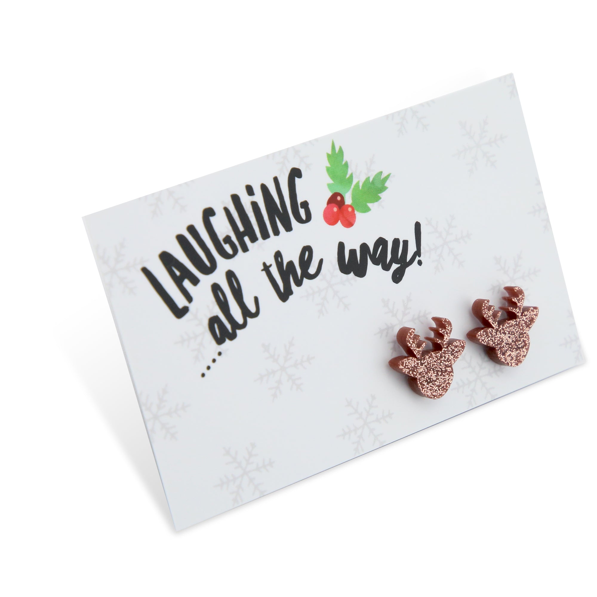 Rose gold glitter reindeer earring studs with hypoallergenic surgical steel posts on laughing all the way card. 