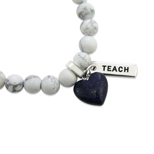 White marble howlite stone bead bracelets with stone heart charm in midnight blue and meaningful word charms. 